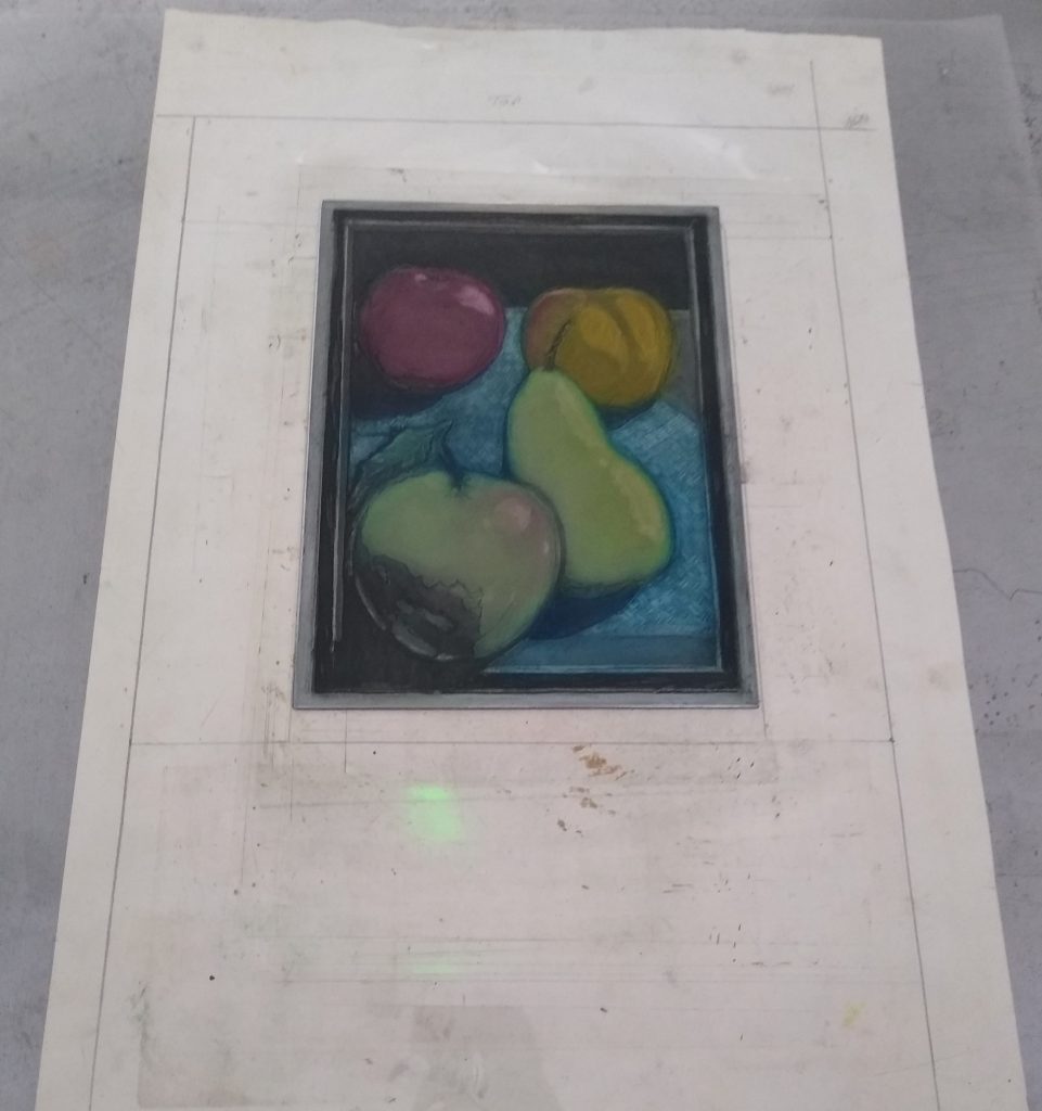 A La Poupee inked steel plate on a printing press bed